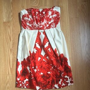 Silk lined strapless dress with boning.